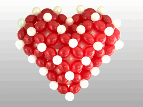 Massief hart van rode ballonnen